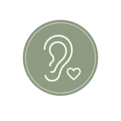 White ear with heart icon inside a muted green circle