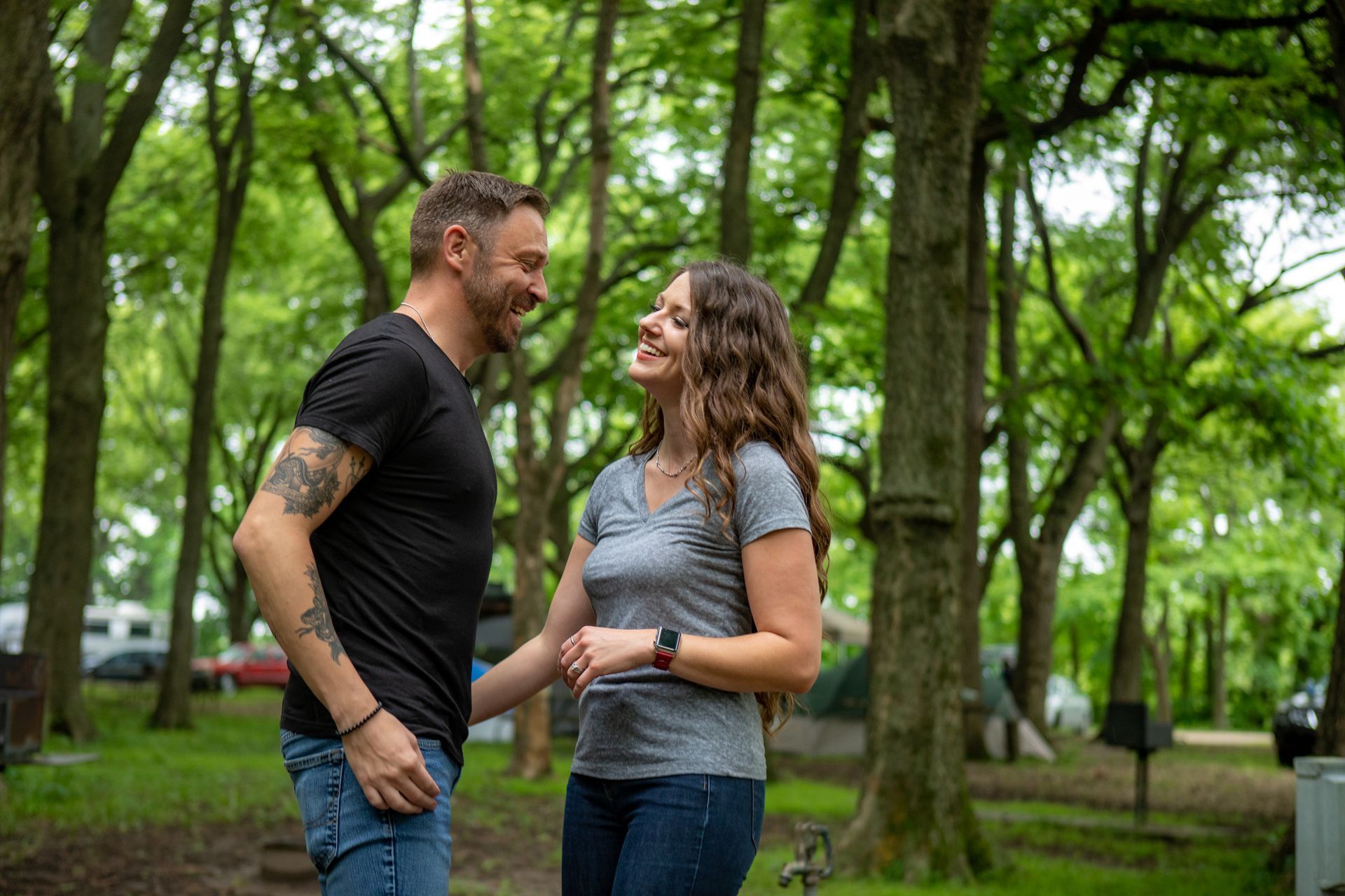 Couple in the woods together. 