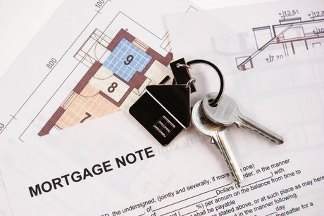 a key on top of papers