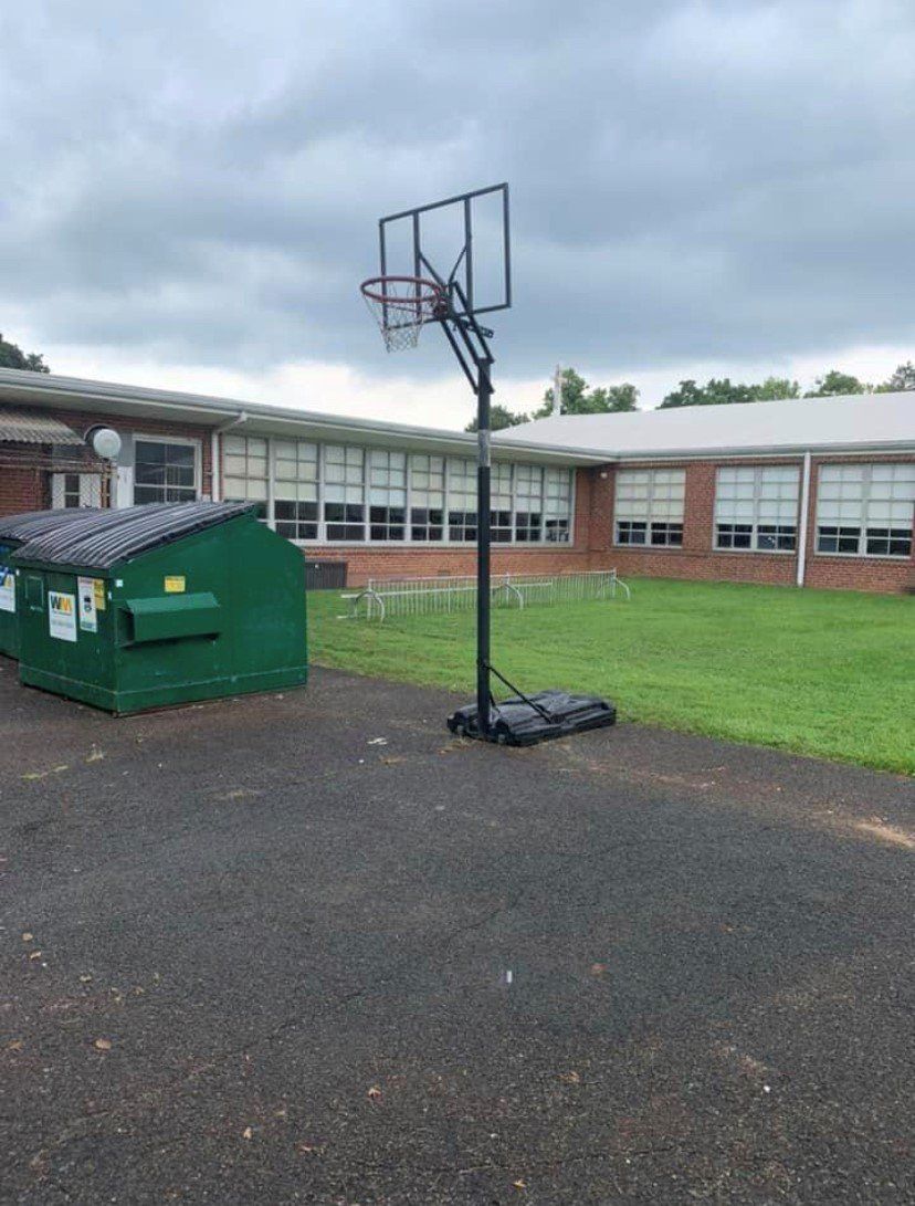 Basketball Court Full Of Woods - Glenolden, PA - McGrory Moving