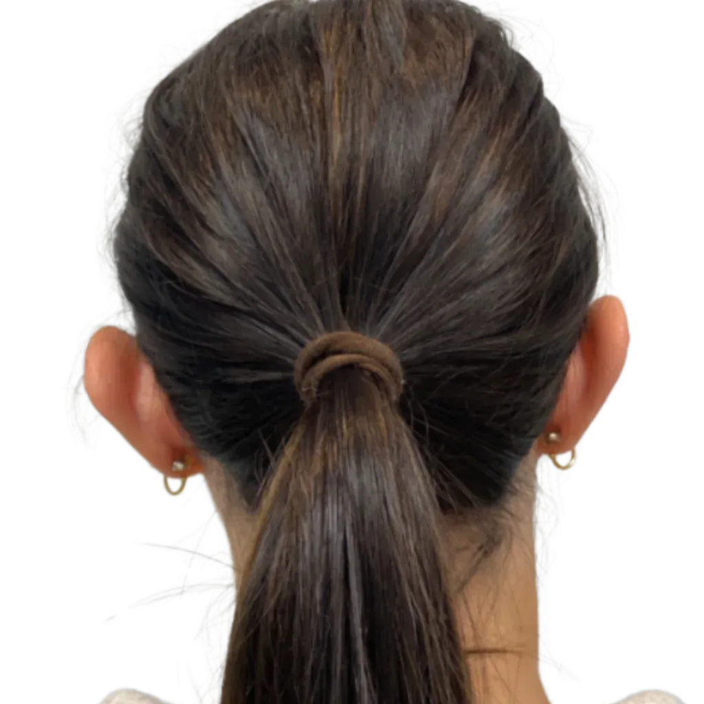 Back view of dark brown hair tied in a low ponytail with a hair tie