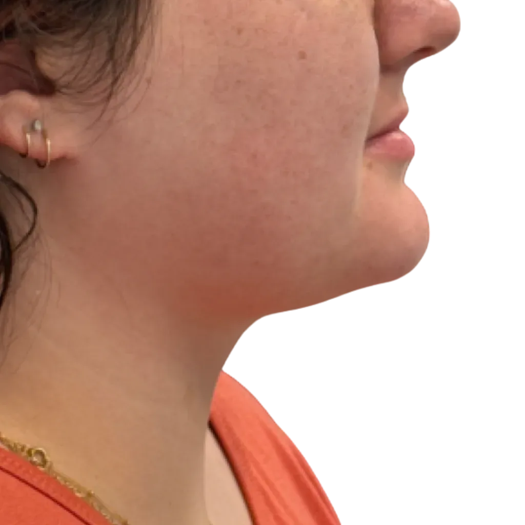 Side profile of a person with a small gold hoop earring, wearing an orange top against a white background