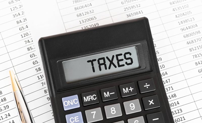 Taxes Written on a Calculator — Austin, TX — Hickson Law PC Taxes Written on a Calculator — Austin, TX — Hickson Law PC