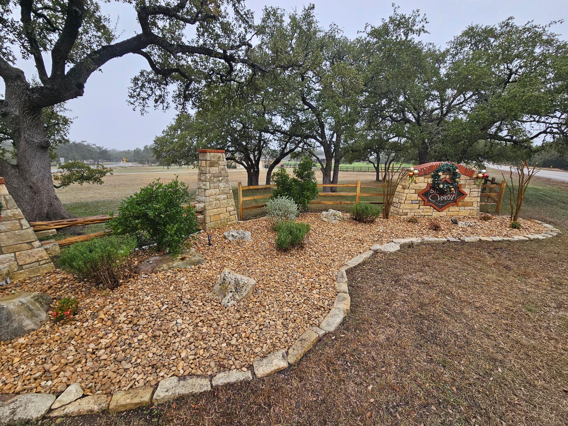 There is a sign in the middle of the yard that says `` welcome ''.