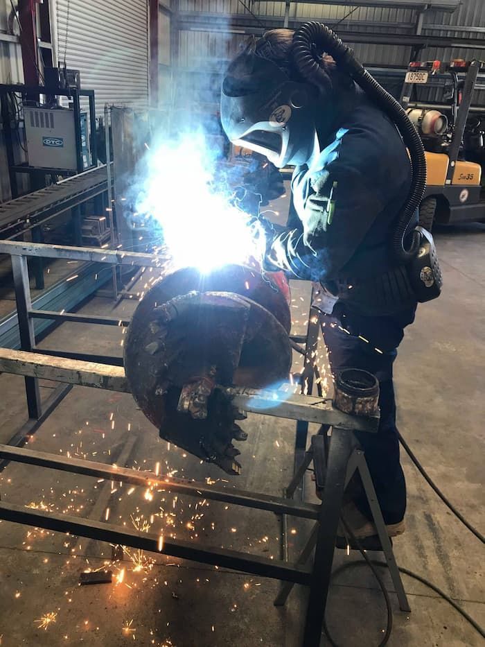 A Welder Working on a Large Piece of Metal — Hardarc Engineering in Coolum Beach, QLD