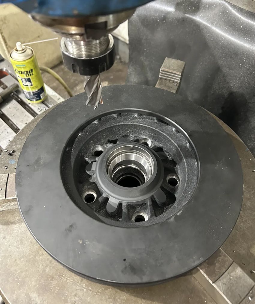 A Machine is Cutting a Brake Disc on a Machine — Hardarc Engineering in Coolum Beach, QLD