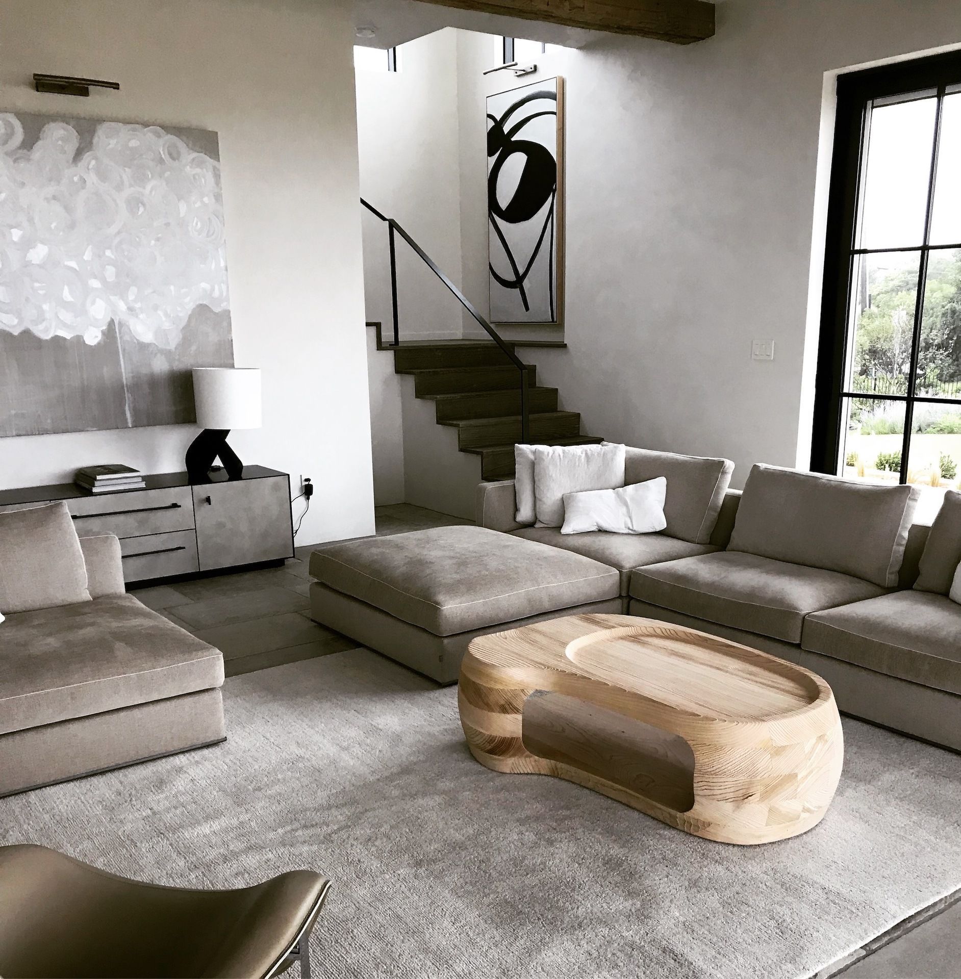 A living room with a couch and a coffee table