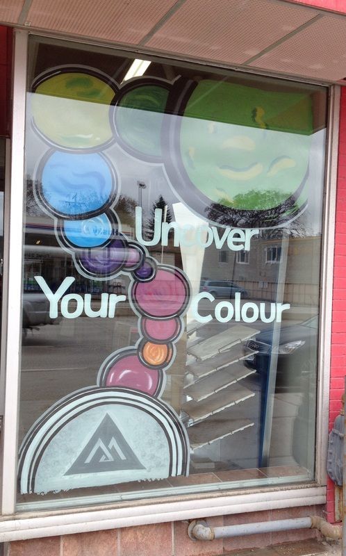 A window with a sign that says your colour on it