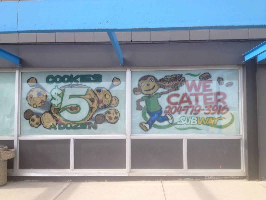 A store front with a sign that says we cater