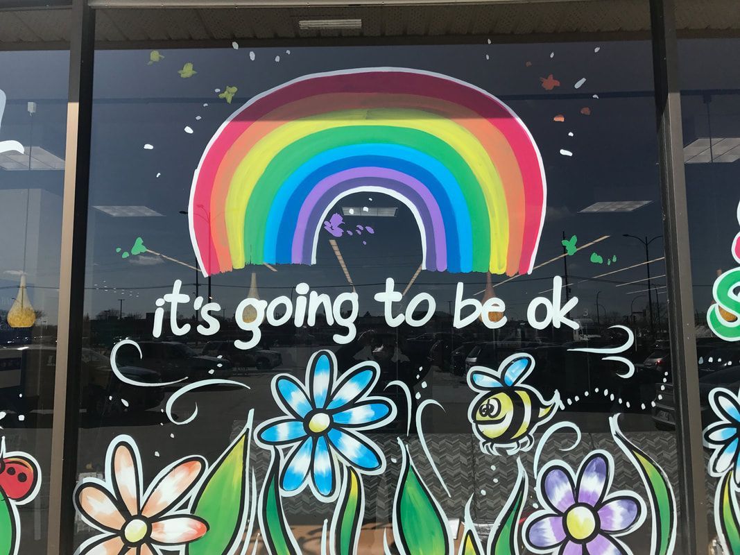 A window with a rainbow and the words it 's going to be ok