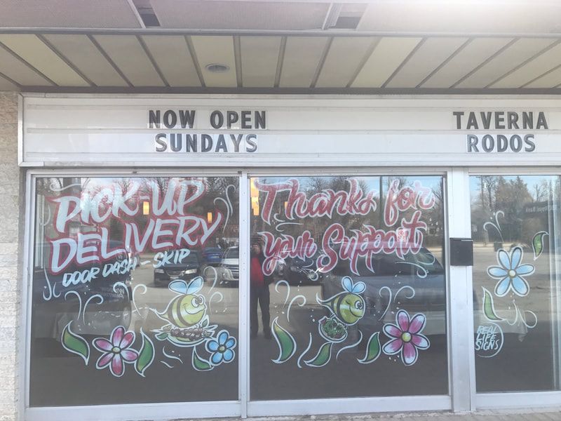 A store front with a sign that says `` now open sundays ''.