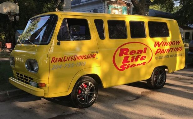 Real Life Signs Yellow Van