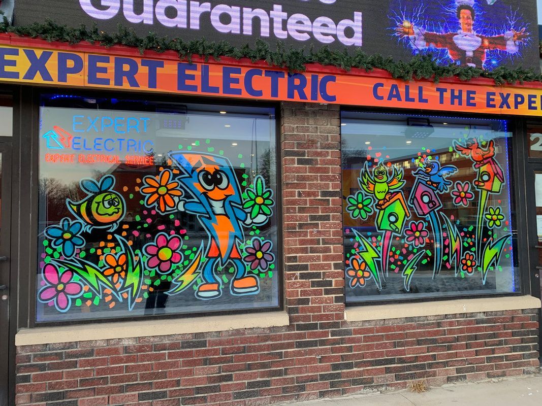 A store front with a sign that says `` guaranteed expert electric call the expert ''.