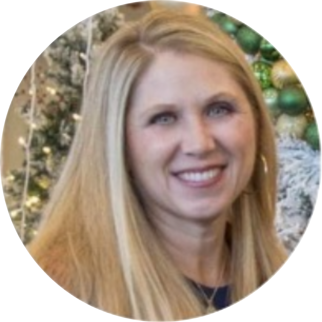 A smiling person with long blonde hair, captured in a circular frame against a background of festive holiday decorations.