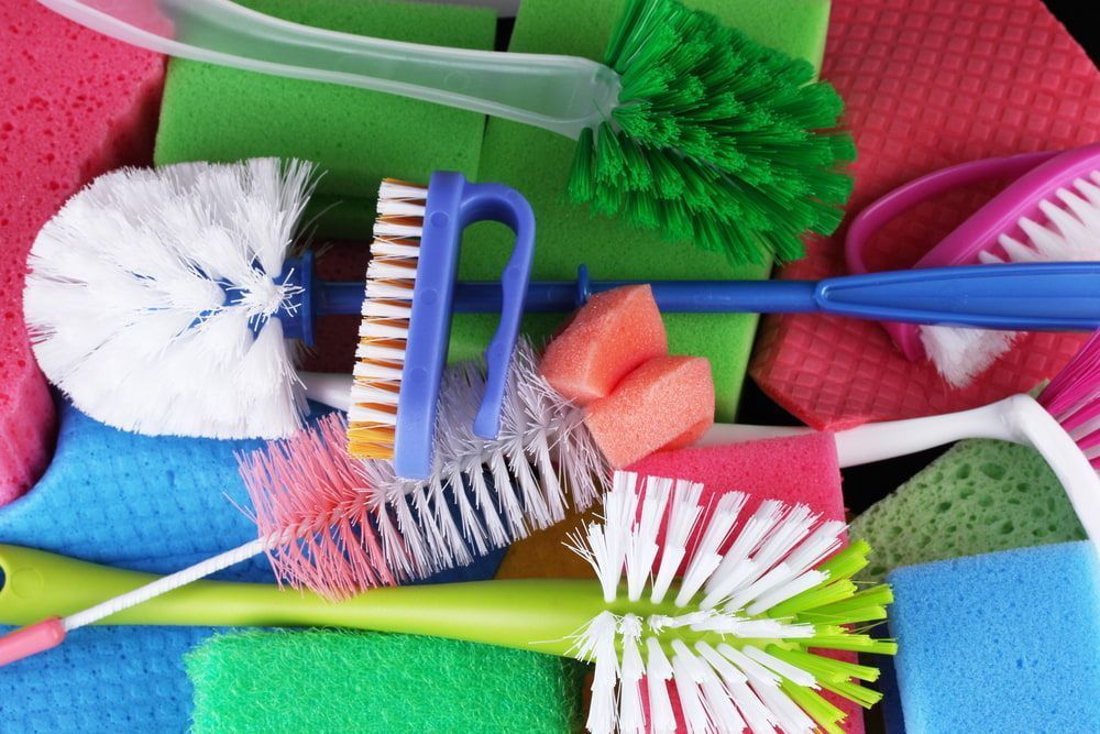 Bunch of Cleaning Supplies Including Brushes and Sponges — Active Cleaning Service Rutherford, NSW