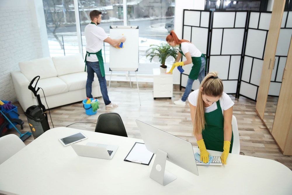 Commercial Cleaners Cleaning An Office