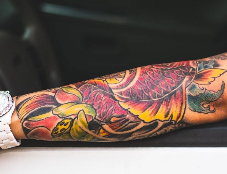 The tattoo clinic pre-laser removal for a coloured tattoo sleeve