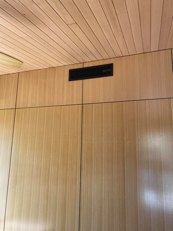 A Wooden Wall With A Ceiling Fan Built Into It — Aircon Mid North Coast in Taree, NSW