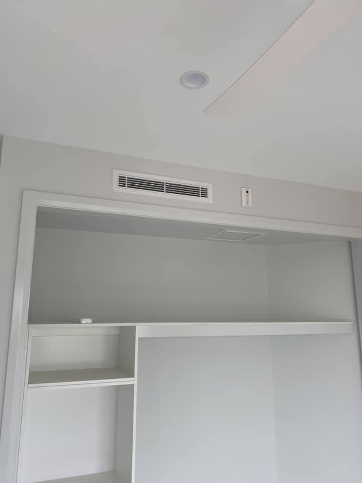 White Cabinet Against Ceiling in Stylish Interior — Aircon Mid North Coast in Forster, NSW