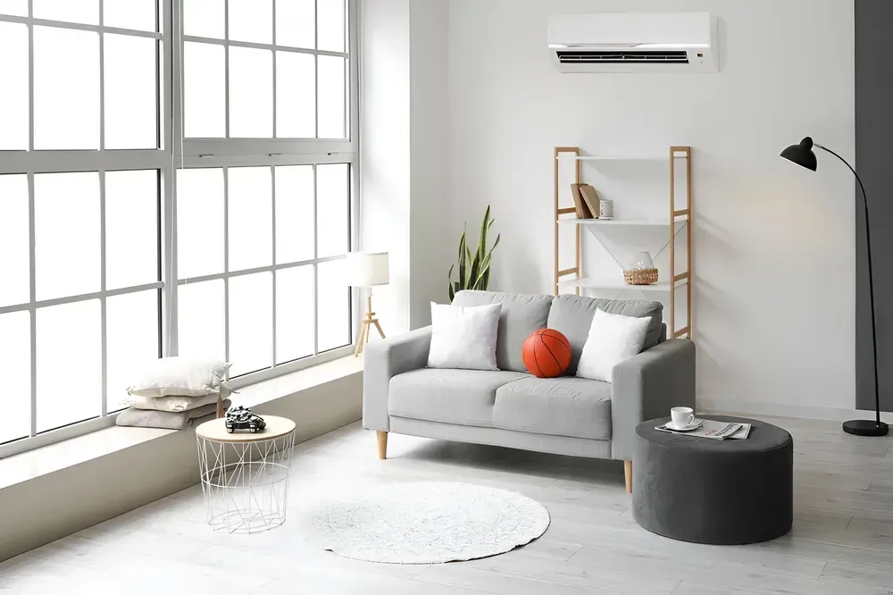 Split system air conditioner mounted in a living room, air conditioning in Port Macquarie by Aircon Mid North Coast