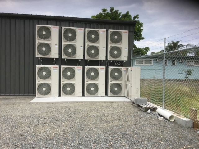 Technician Repairing Aircon — Aircon Mid North Coast in Pacific Palms, NSW