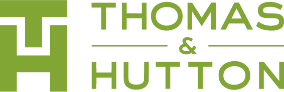 The logo for thomas and hutton is green and white.