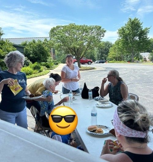 People Snacking Together at Fairview Church of Christ's Dumpster & Fire Event in Columbia, MO