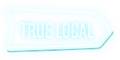 A blue sign that says `` true local '' on a white background.