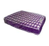 A purple mattress with a clear plastic cover on it.