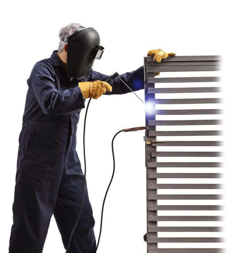 Welder Welding a Metal Gate