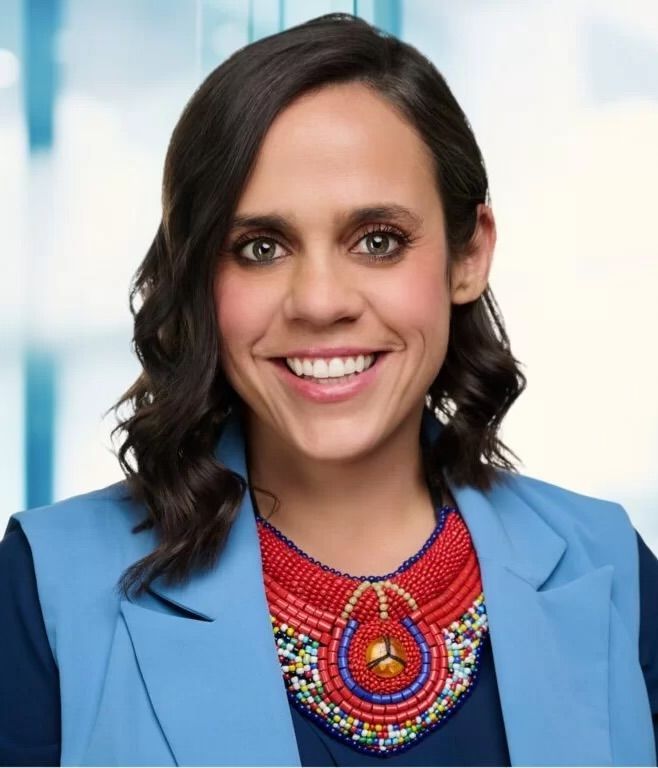 woman in blue vest
