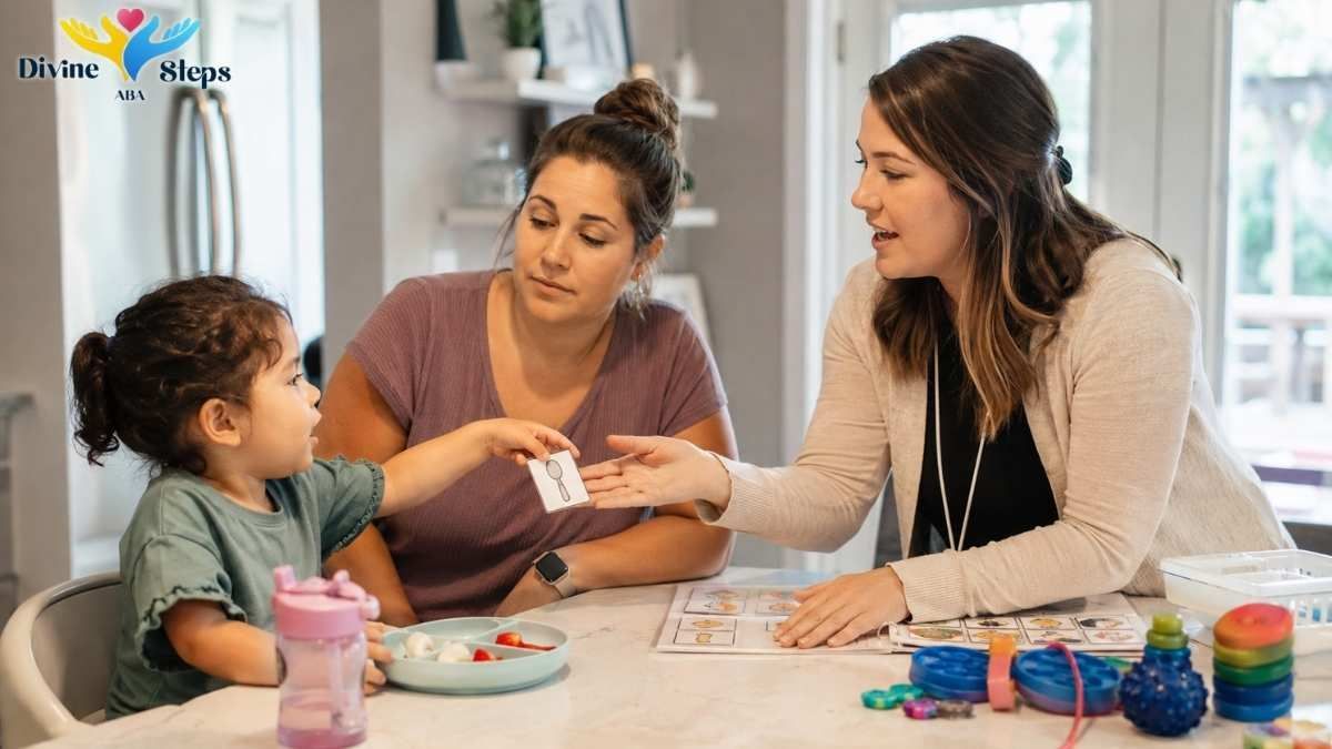 aba-therapist-using-picture-cards-with-toddler-and-mother
