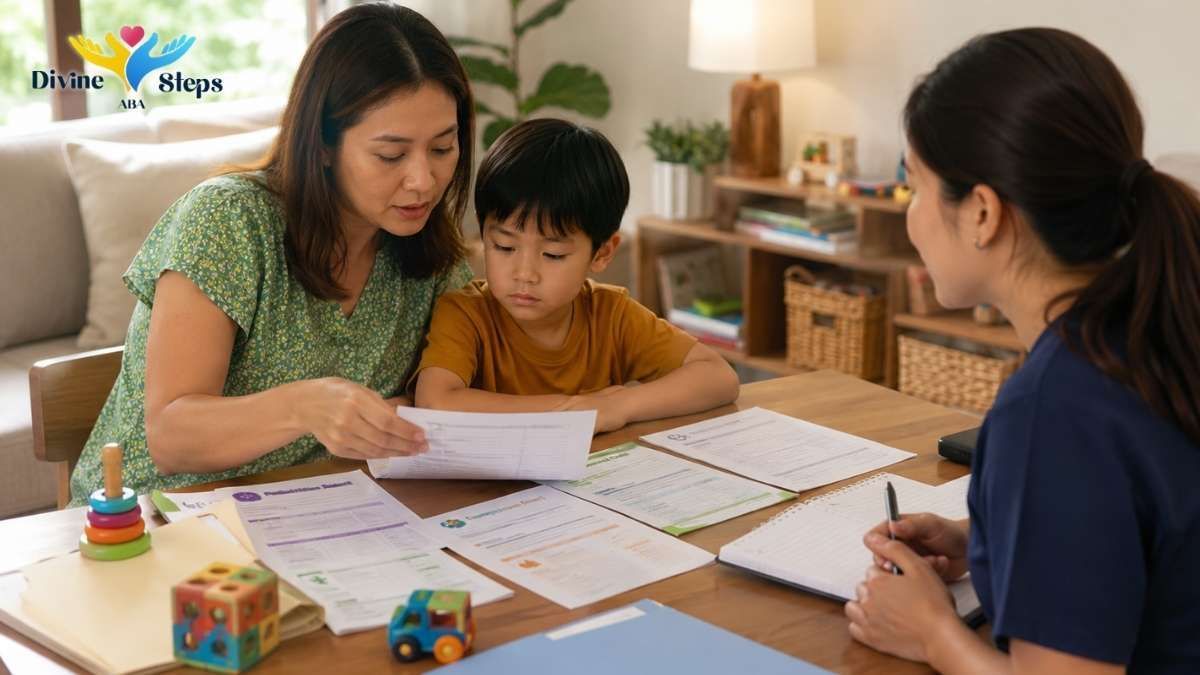 mother-and-son-reviewing-intake-forms-with-clinician-at-table