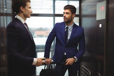 two men in suites