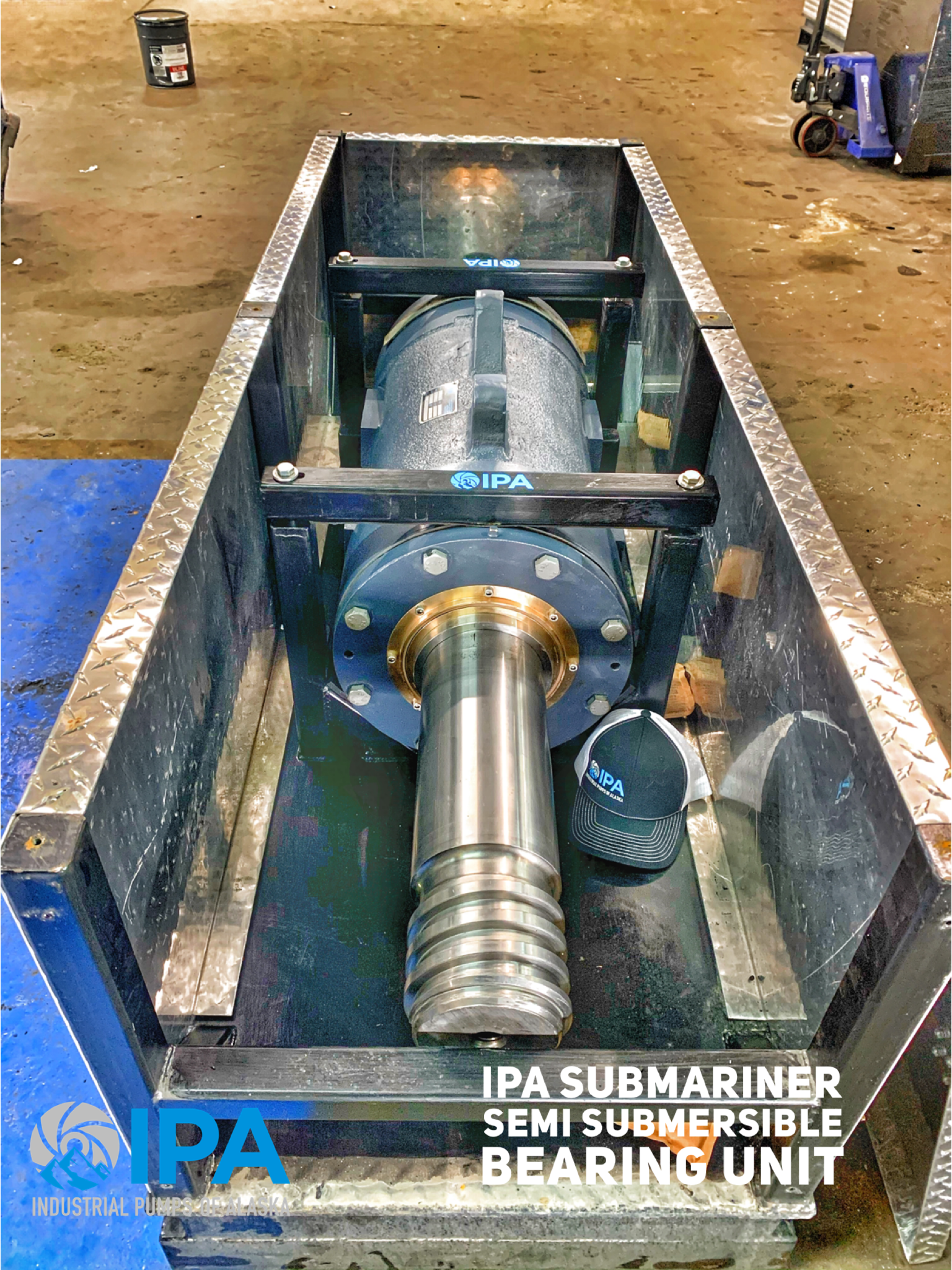 A large metal object is sitting inside of a metal box.