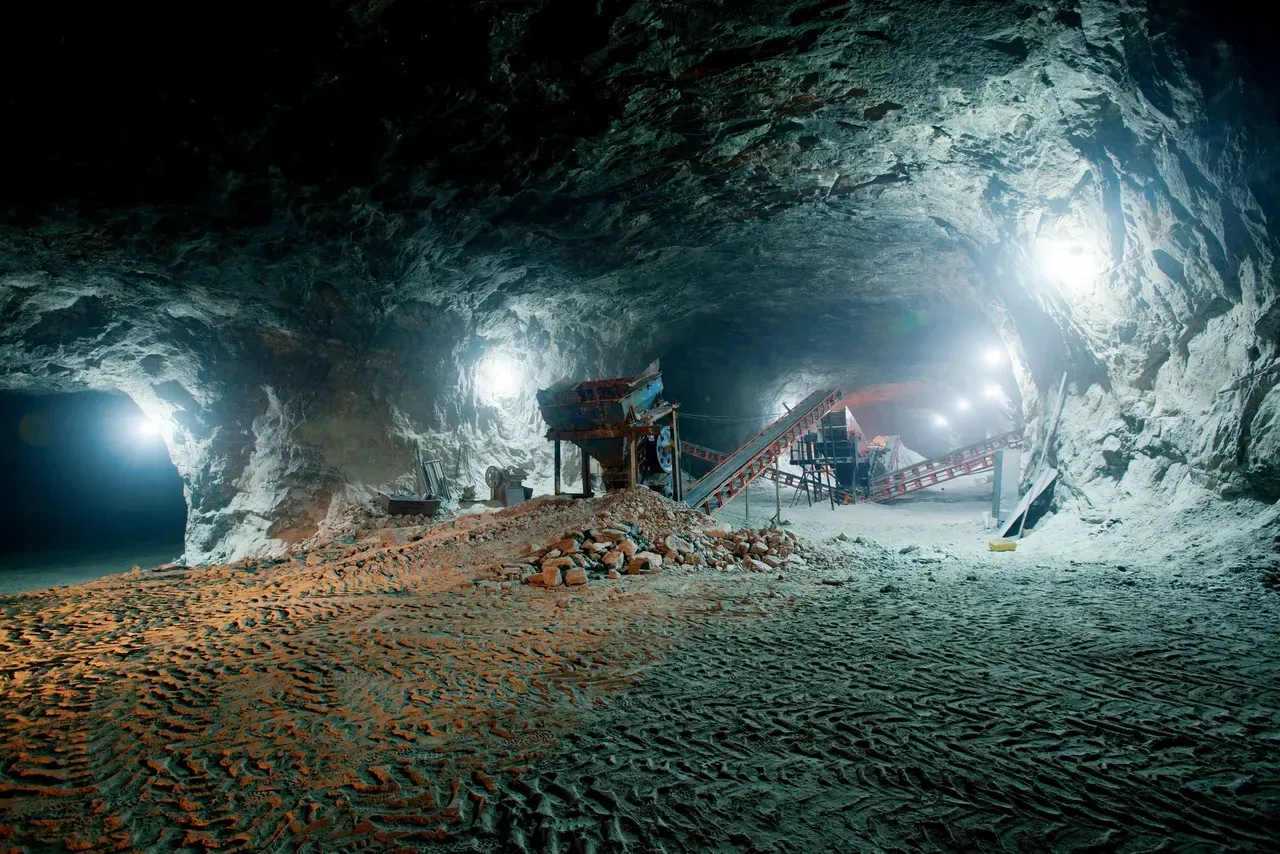 A group of people are working in a cave.