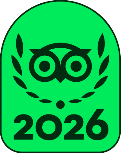 Bright green badge with owl logo and laurel wreath, labeled “2026” at the bottom.