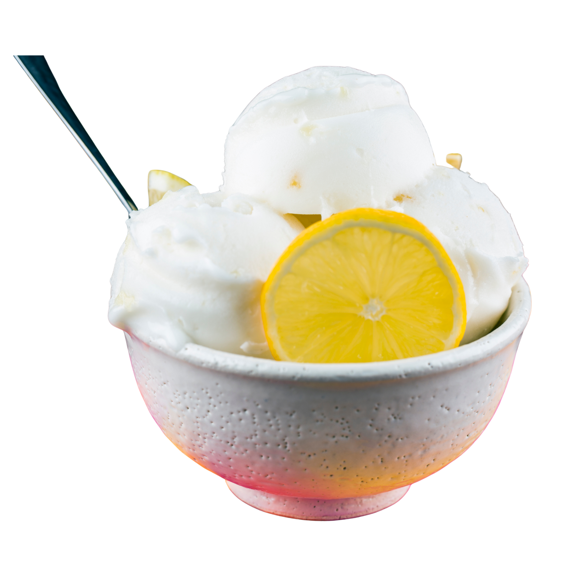 White lemon sorbet in a speckled bowl with a lemon slice and spoon