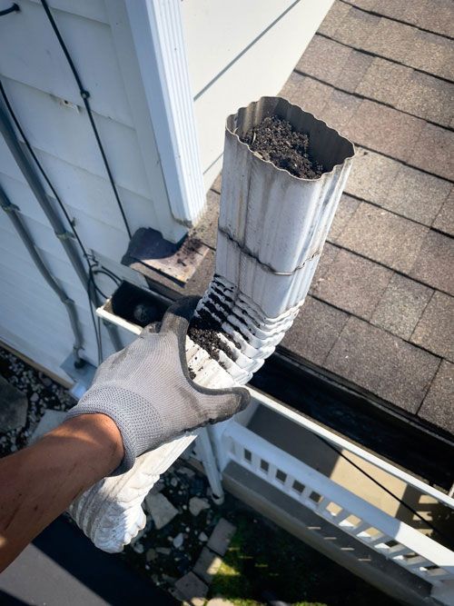 Cleaning Clogged Downspout — Clarksville, TN — GutterPRO, Inc.
