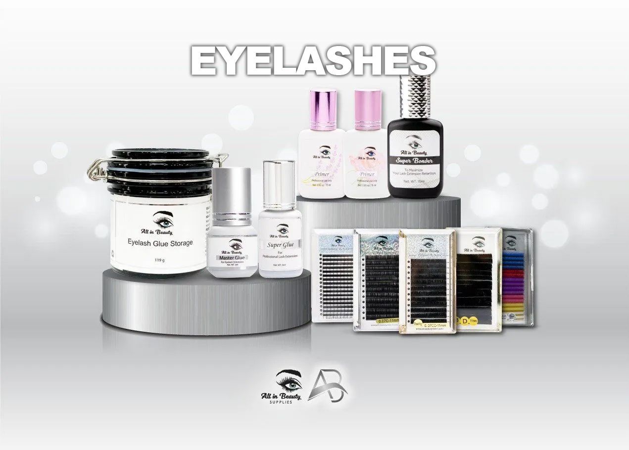 Eyelash extension products displayed on a silver platform, including glue, lashes, and tools.