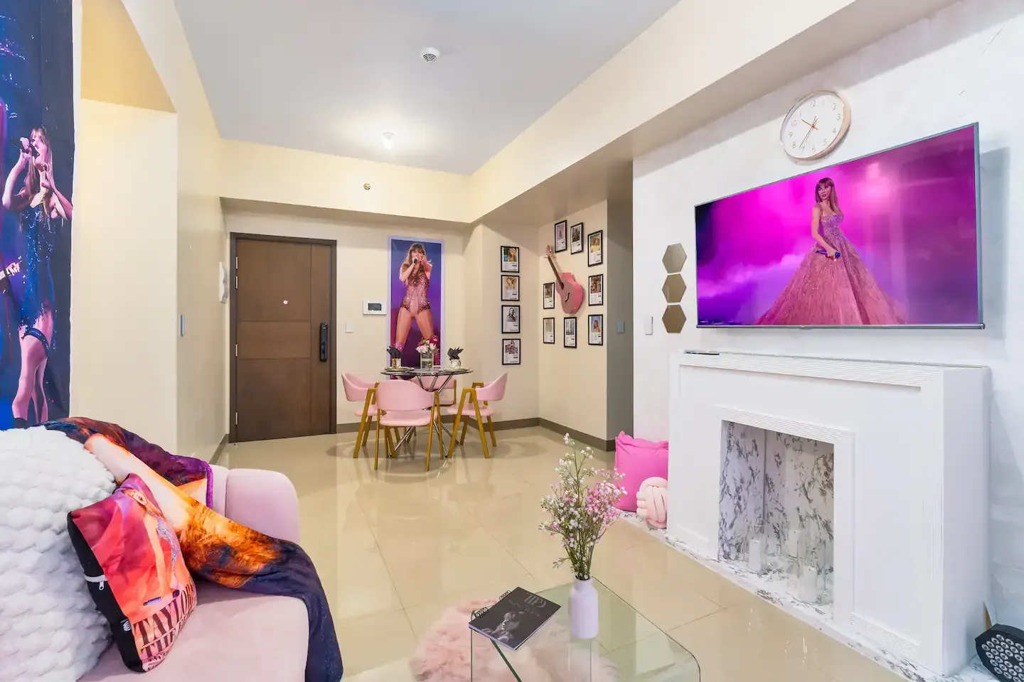 A Taylor Swift Inspired living room with a couch , fireplace and television at Bayshore Luxe by Prime, Manila