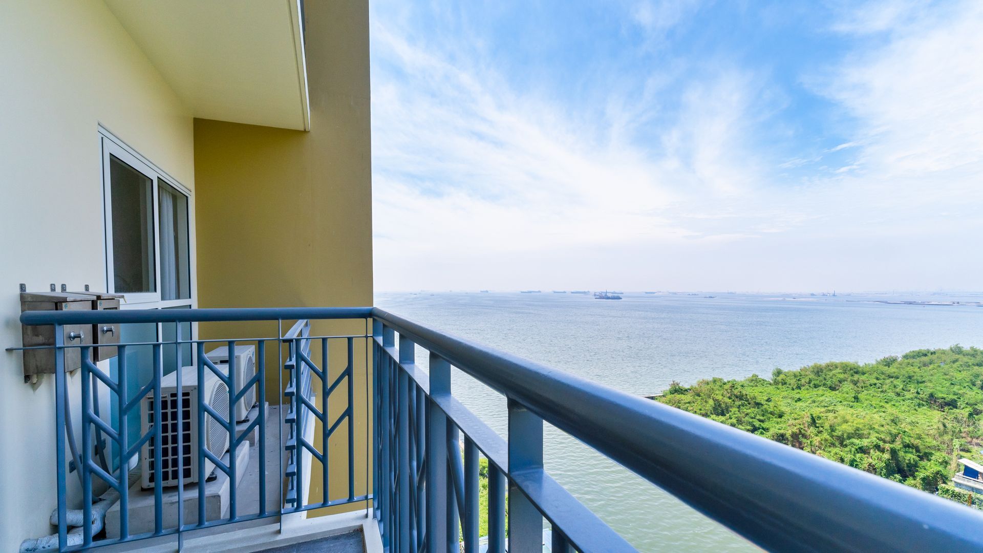 Gray coloured Balcony with view of canal and ocean
