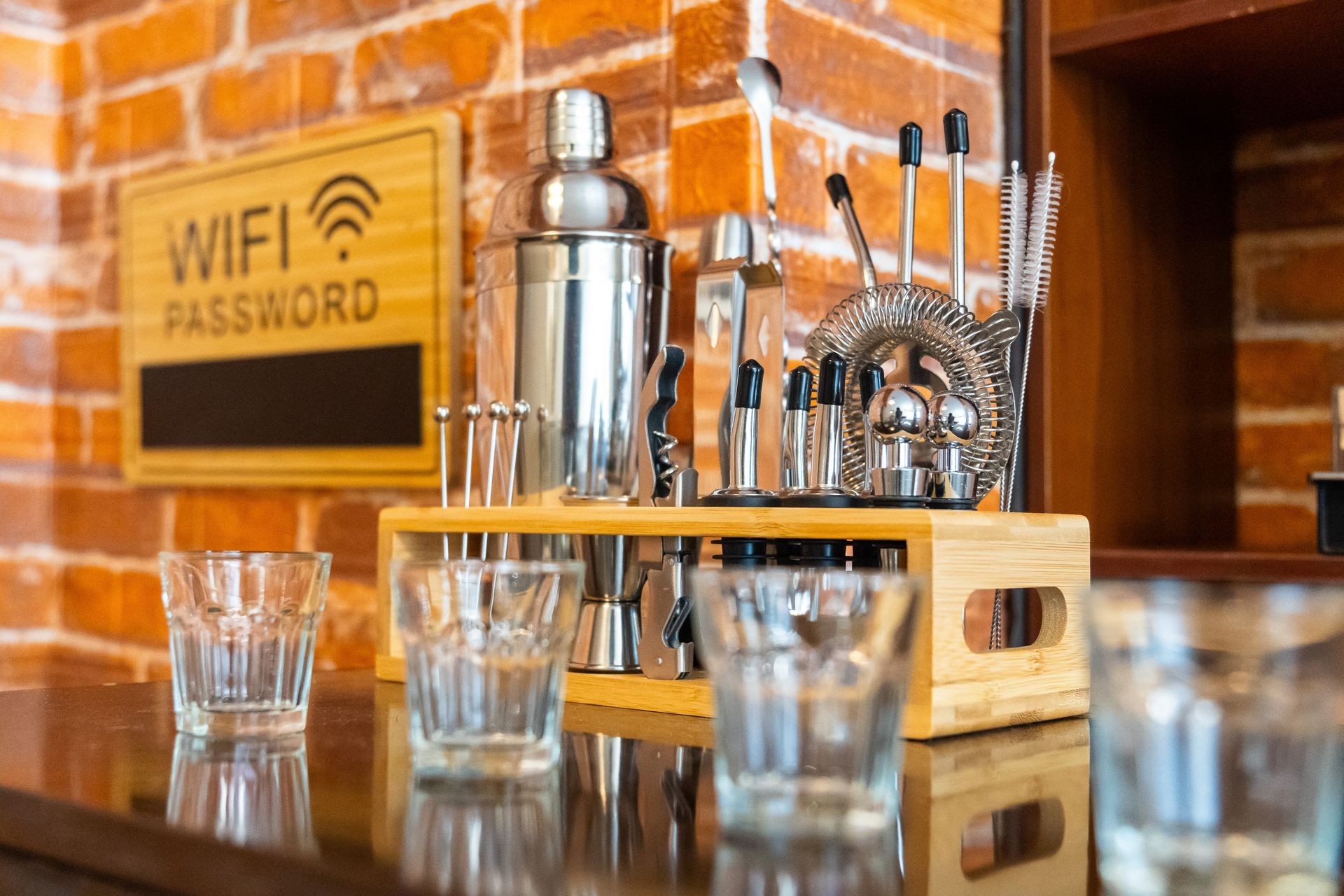 Cocktail making utensils and shot glasses