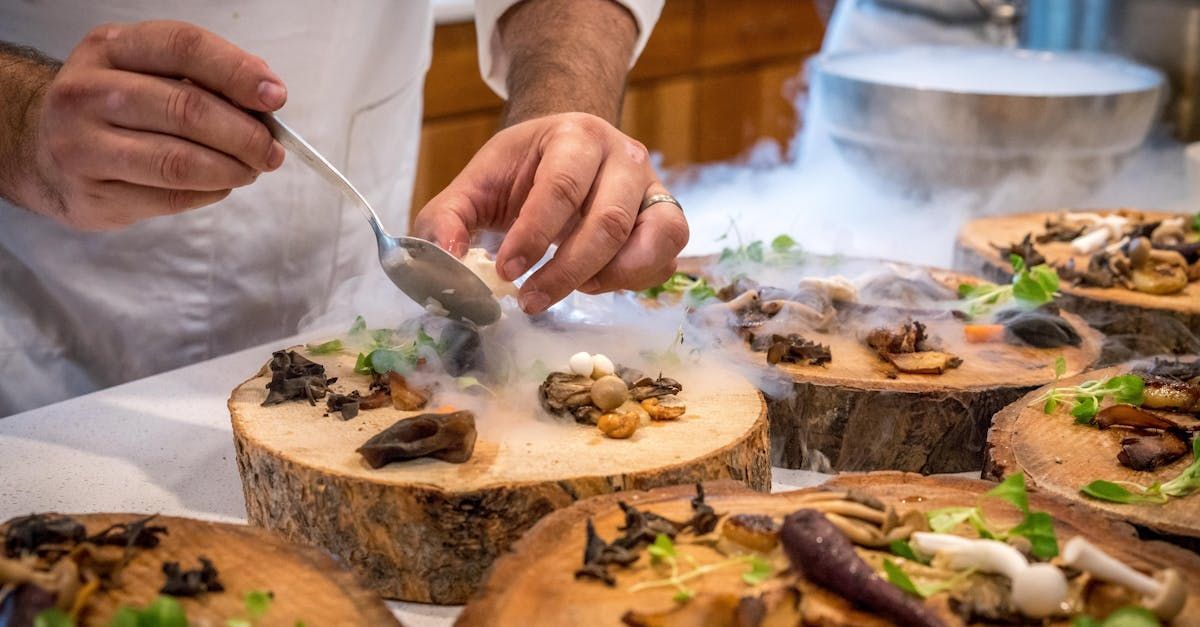 A chef is preparing a meal on a wooden stump.