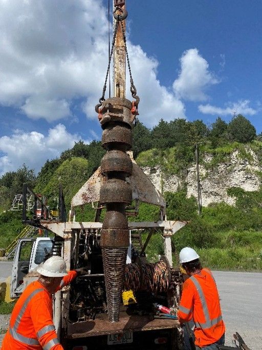 Industrial line shaft turban pump inspection at local rock mine.