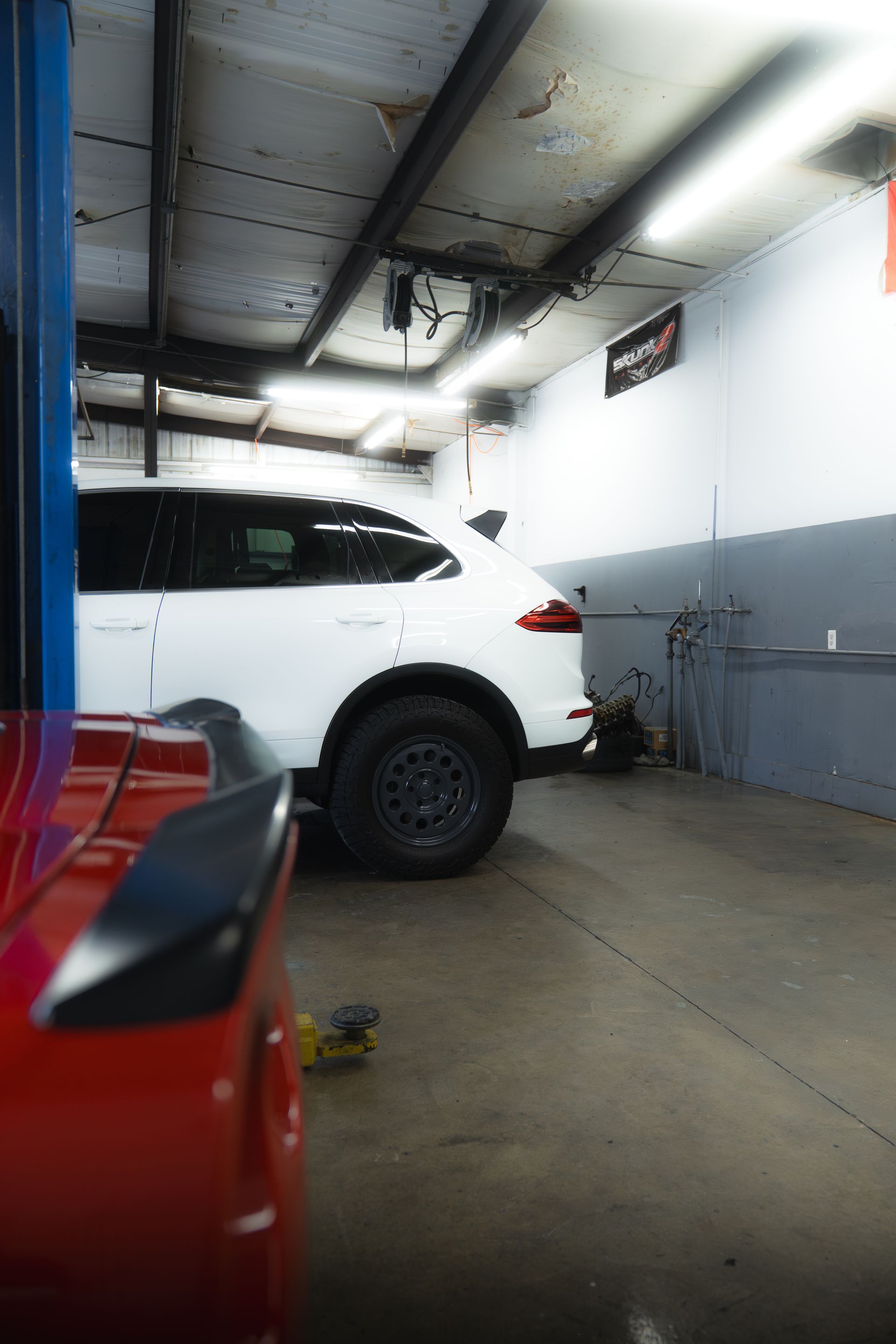 A White Porsche Cayenne Parked in Our Garage at Station One in Hilton Head Island, SC