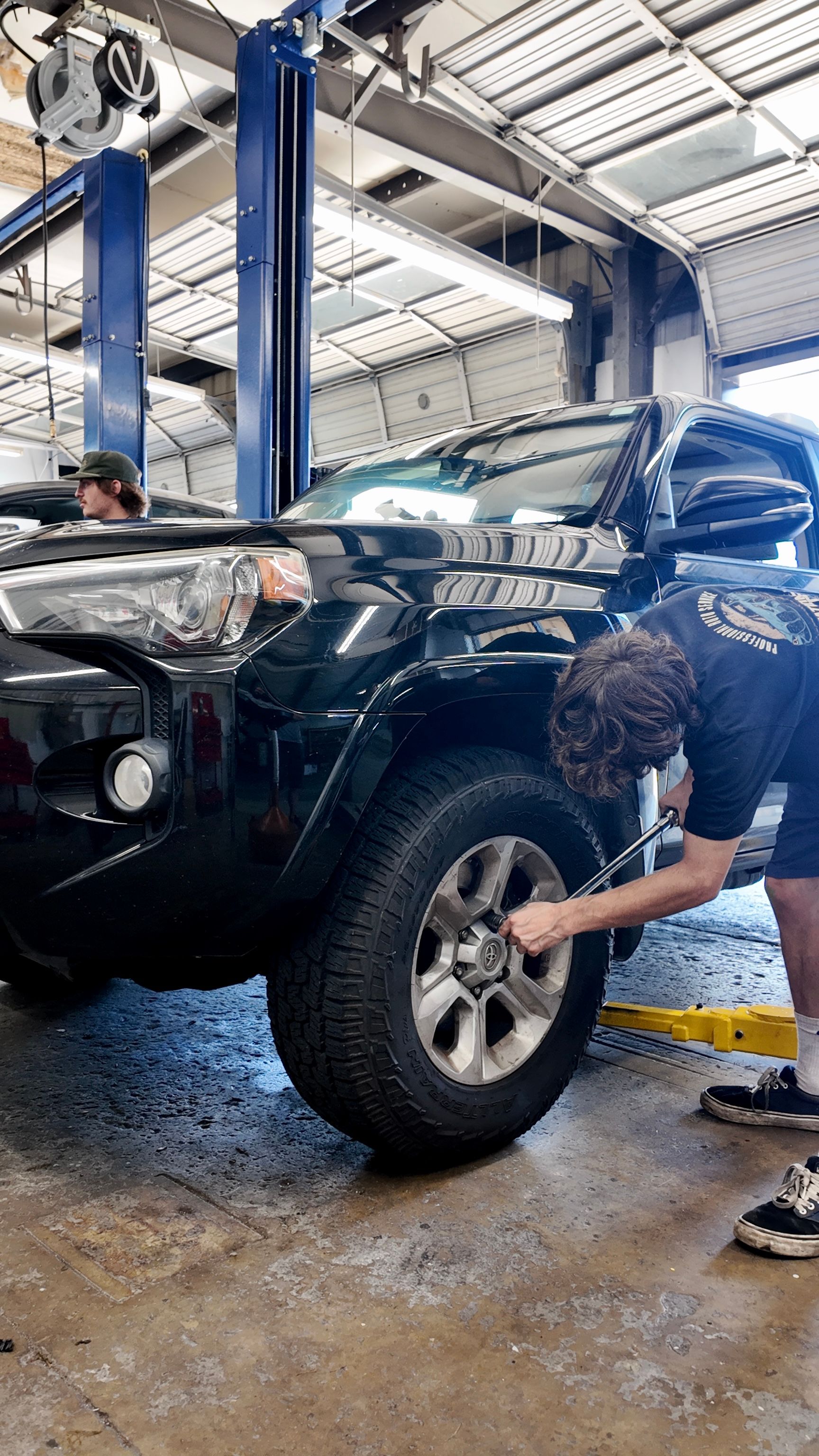Our Mechanic Checks the Vehicle's Wheel at Station One in Hilton Head Island, SC