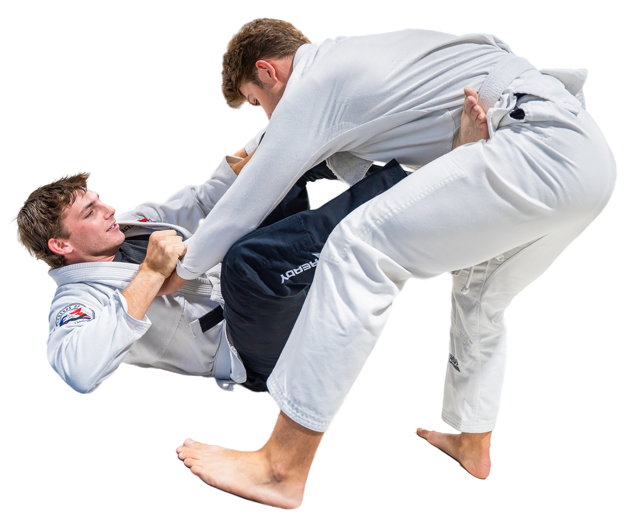Two martial artists in white gis grappling on a white background