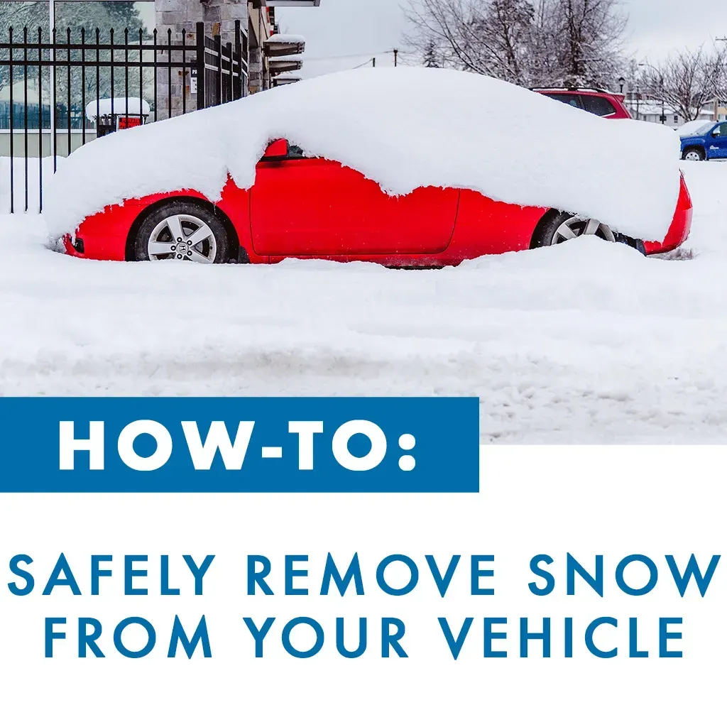 A red car is covered in snow and says how to safely remove snow from your vehicle
