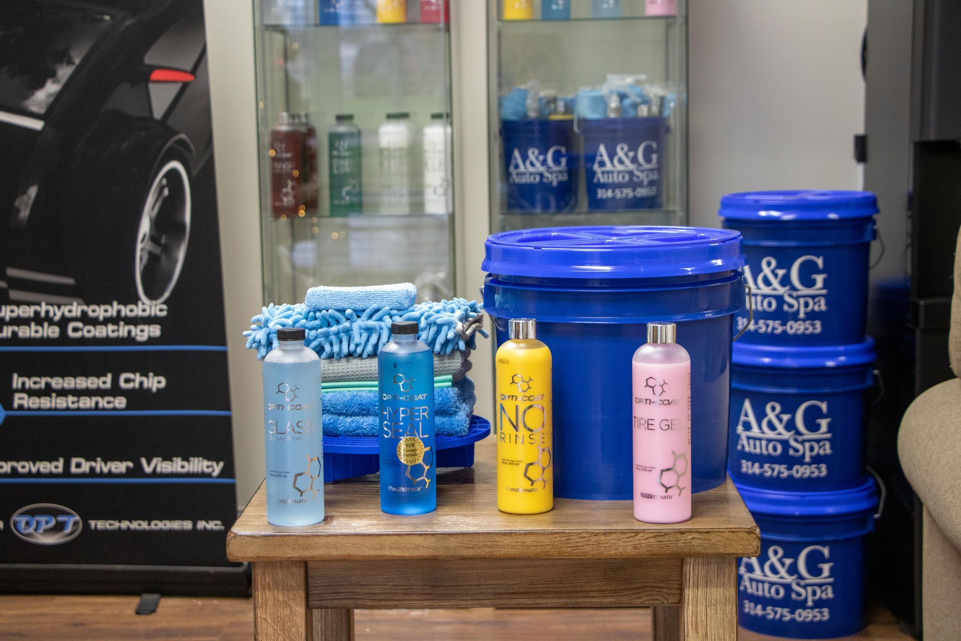 A display of a & g auto spa products on a table